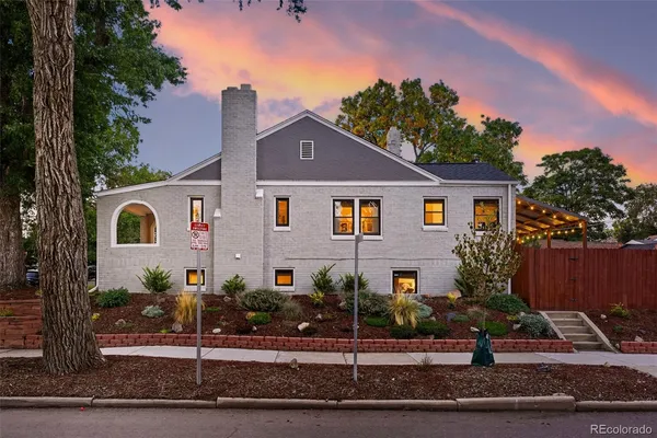 a front view of a house with garage