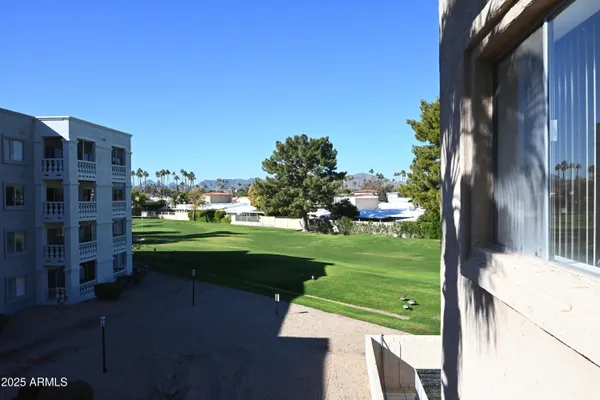 a view of a chairs in front of building