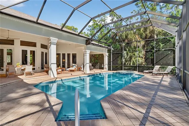 a view of a house with swimming pool
