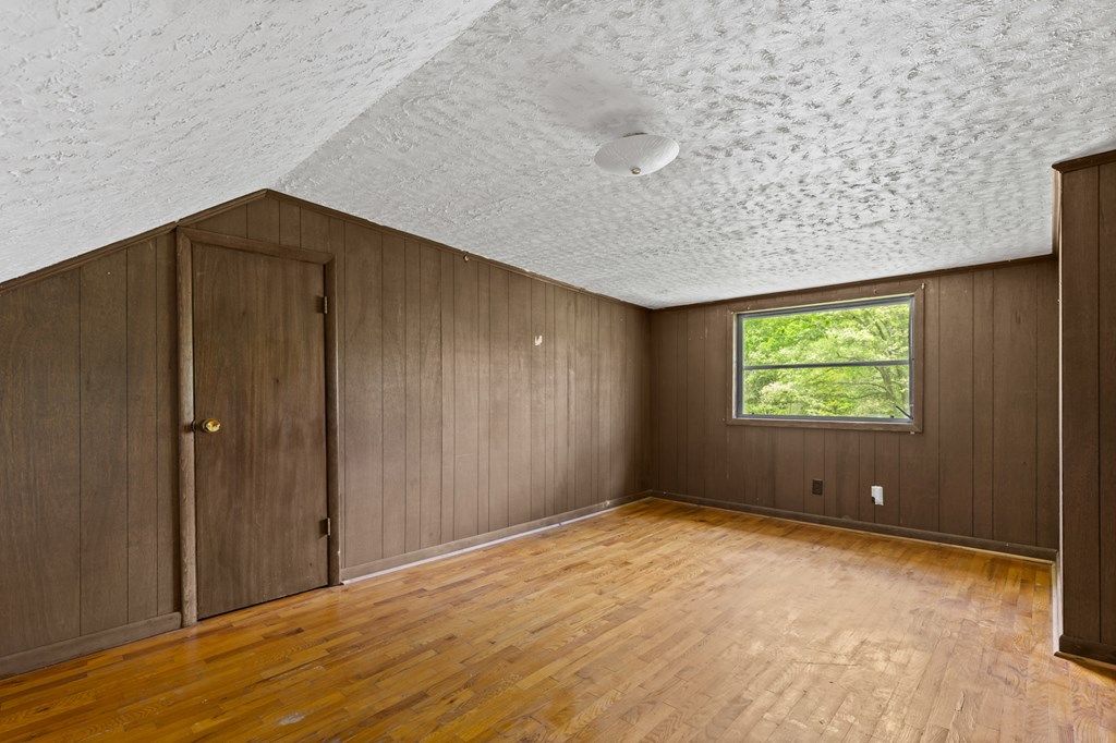 7255 Blue Ridge Drive Blue Ridge, GA 30513 - Photo 19 of 24 a view of an empty room with window and closet area