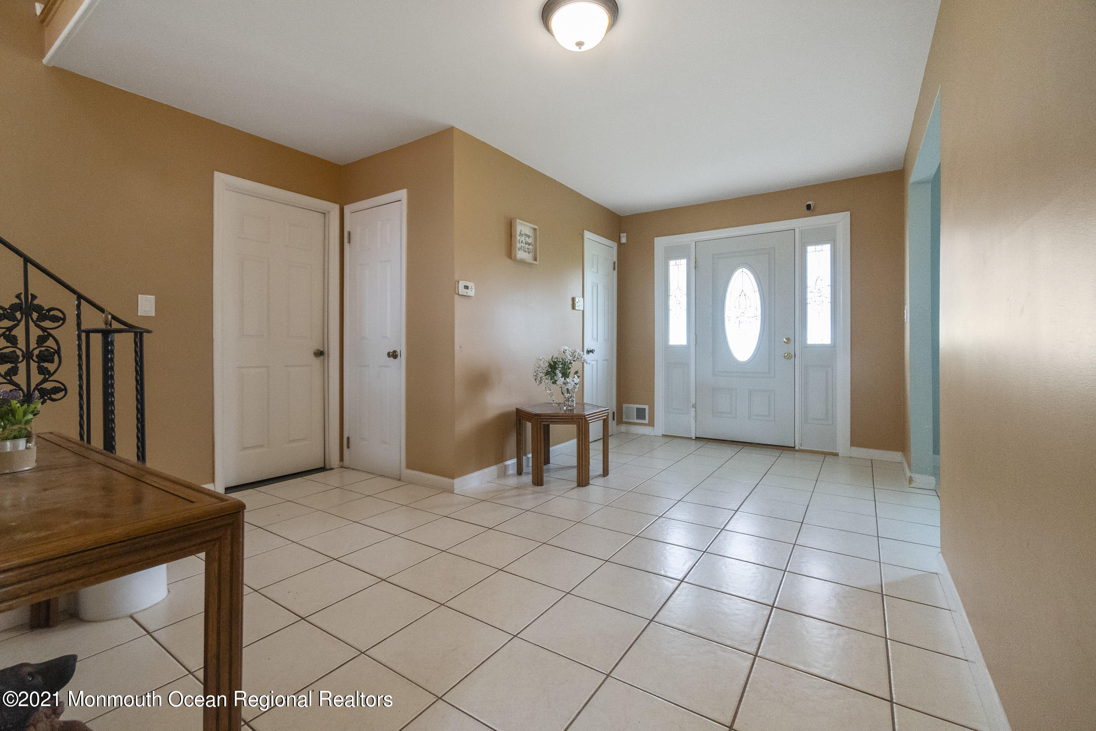 27 South Westfield Road Howell, NJ 07731 - Photo 3 of 27 a view of a livingroom with a dinning table and chair