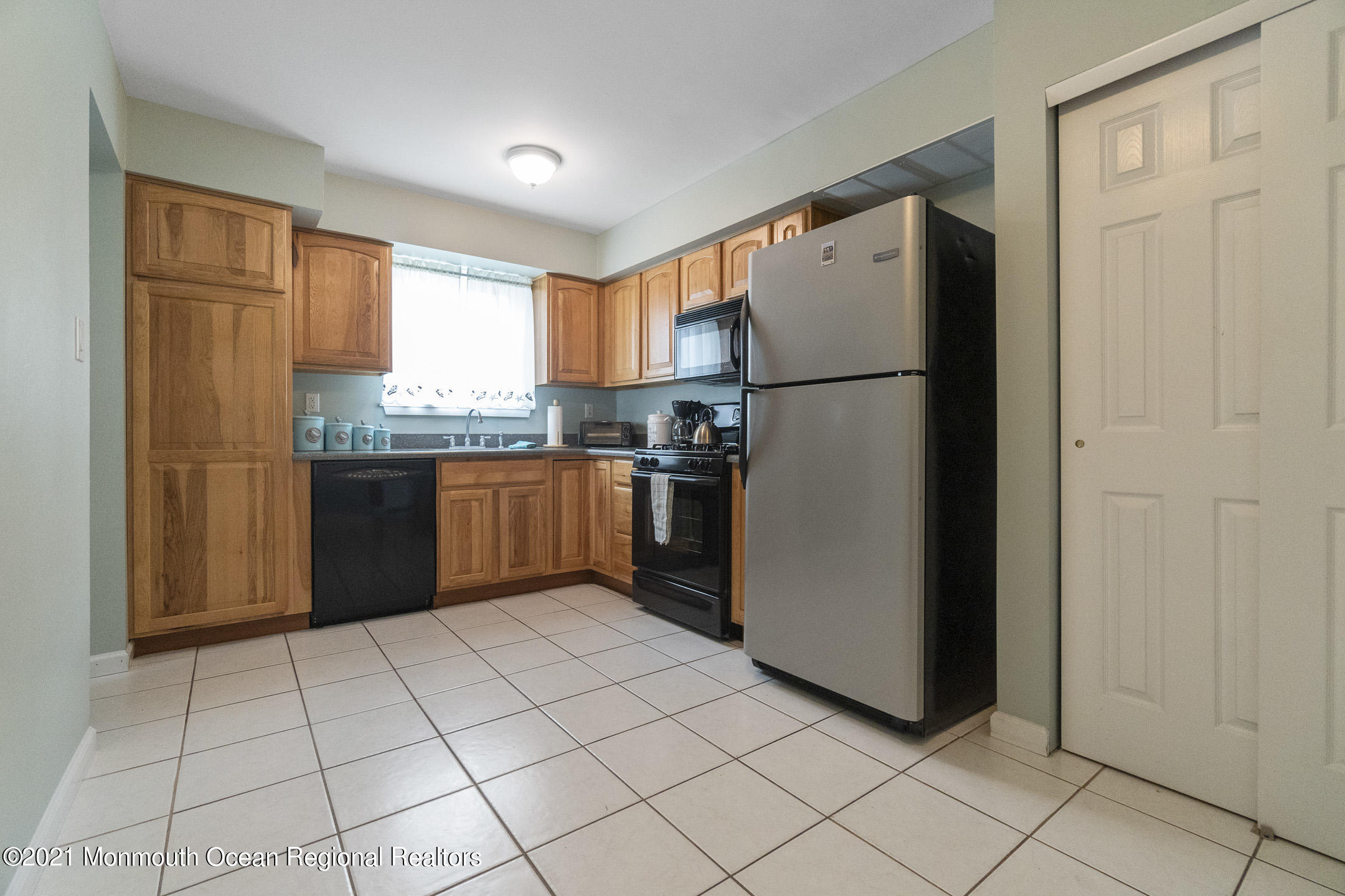 27 South Westfield Road Howell, NJ 07731 - Photo 9 of 27 a kitchen with stainless steel appliances granite countertop a refrigerator and a sink