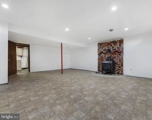a view of a balcony with wooden floor