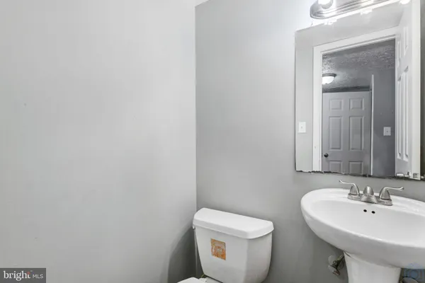 a view of a room with wooden walls