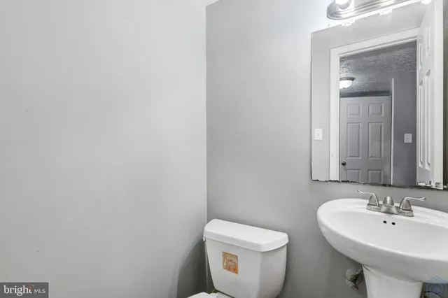 a view of a room with wooden walls