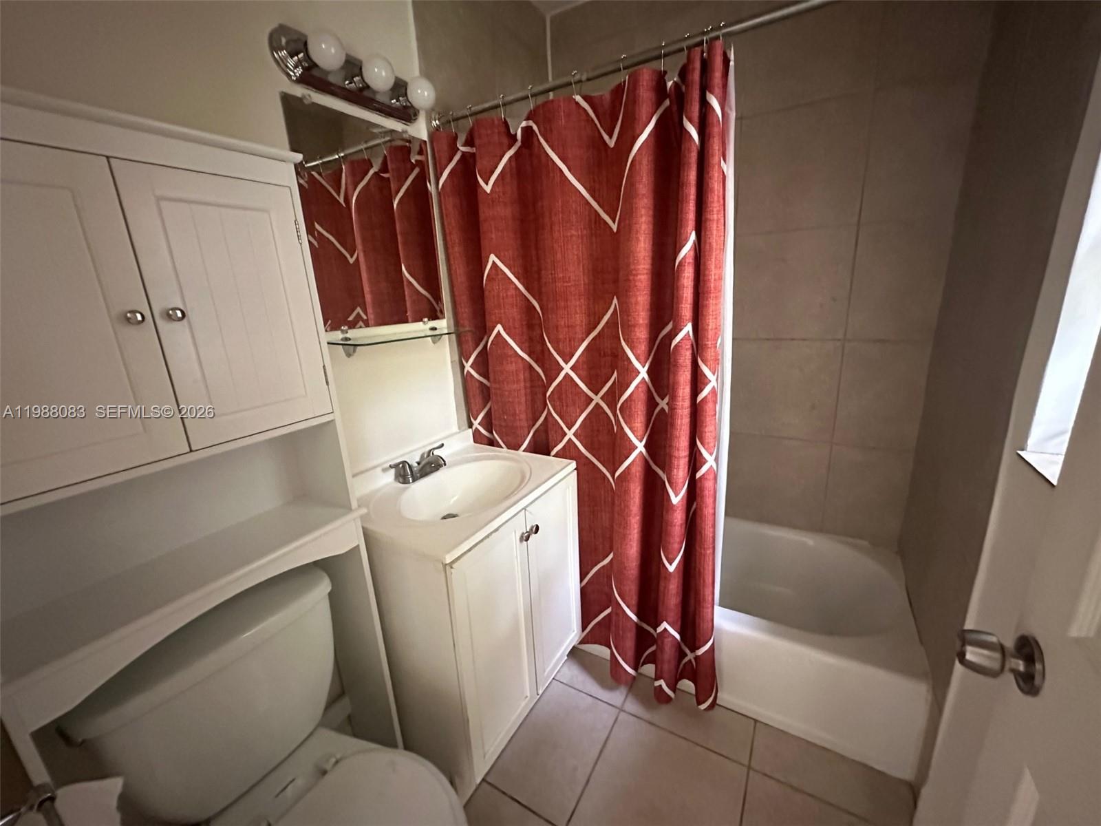 565 Northeast 65th Street, Unit 2 Miami, FL 33138 - Photo 4 of 7 a utility room with dryer and washer