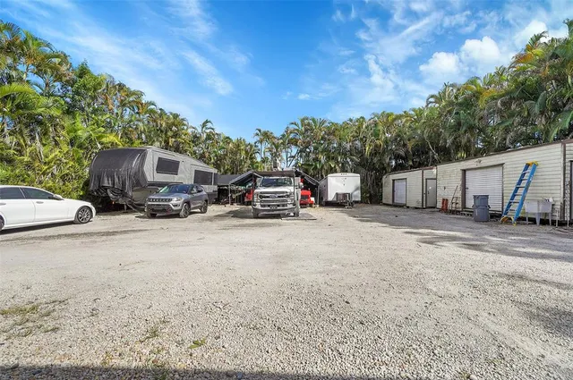 a view of car parked on the side of road