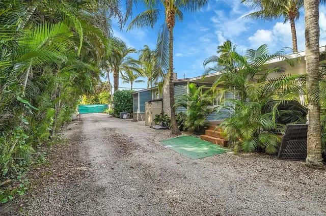 a view of a house with a garden
