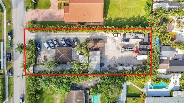 an aerial view of a house with a garden