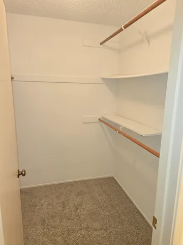 a view of small space with racks on the wall