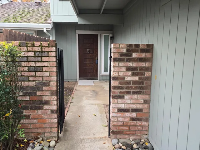 a front view of a house with a garage