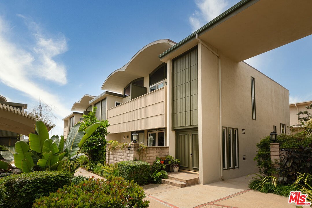 13214 Fiji Way, Unit P Marina del Rey, CA 90292 - Photo 1 of 41 a front view of a house with a yard