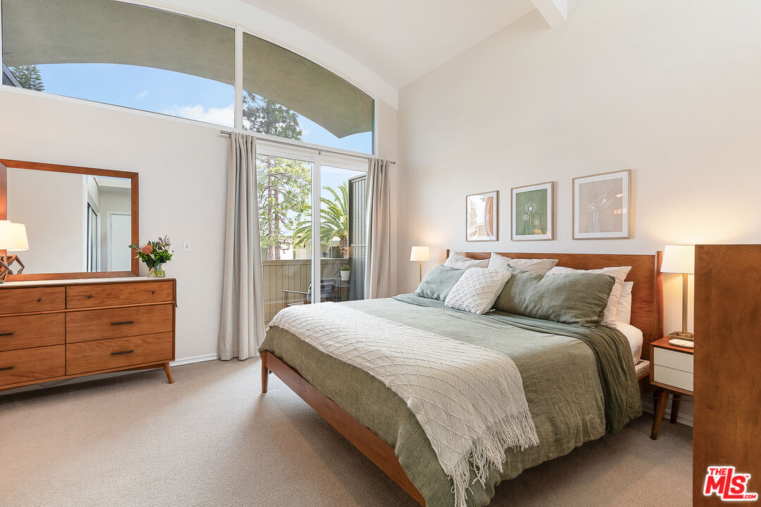 13214 Fiji Way, Unit P Marina del Rey, CA 90292 - Photo 20 of 41 a bedroom with a bed dresser and a window