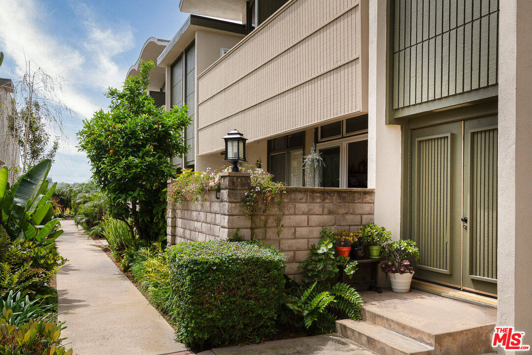 13214 Fiji Way, Unit P Marina del Rey, CA 90292 - Photo 2 of 41 a view of a house with potted plants