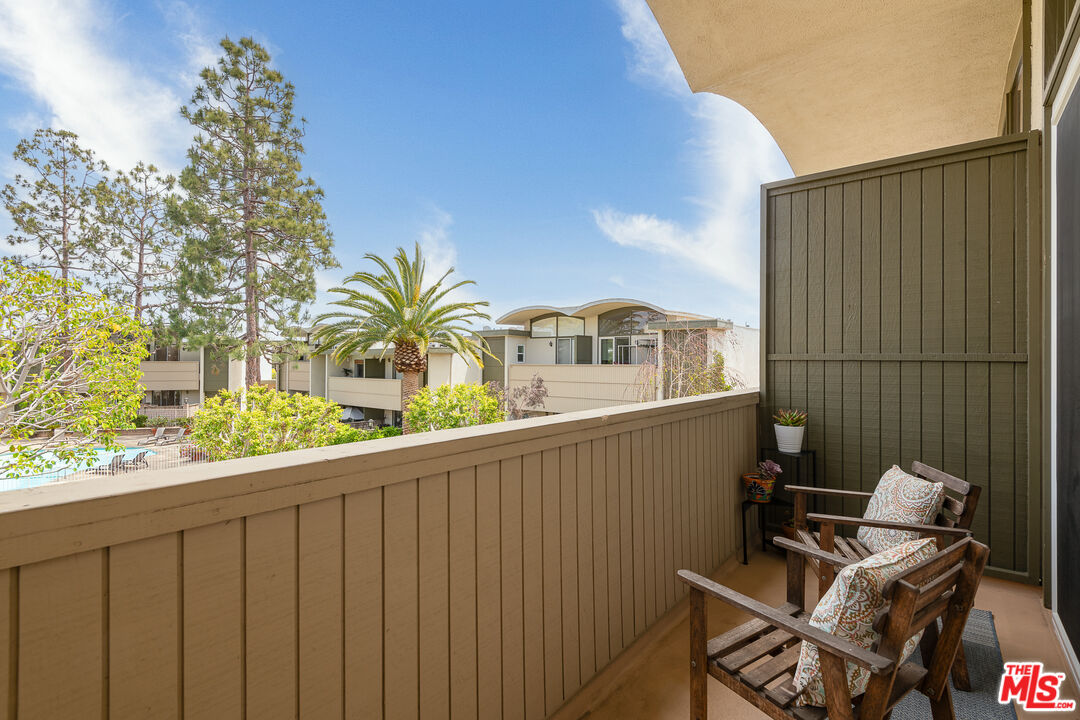 13214 Fiji Way, Unit P Marina del Rey, CA 90292 - Photo 23 of 41 a view of balcony with wooden floor and seating space