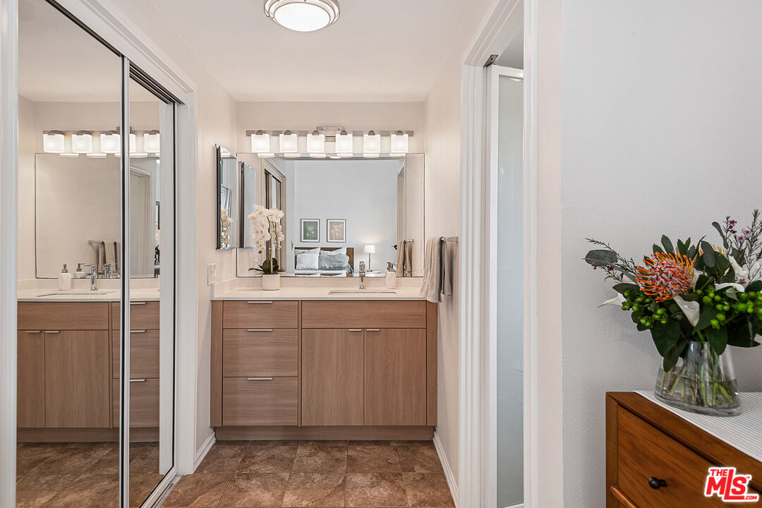 13214 Fiji Way, Unit P Marina del Rey, CA 90292 - Photo 26 of 41 a bathroom with a sink vanity and a mirror