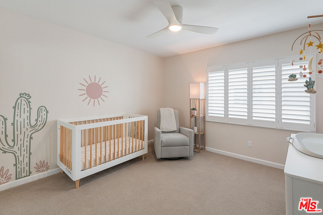13214 Fiji Way, Unit P Marina del Rey, CA 90292 - Photo 27 of 41 a bedroom with a bed and a window