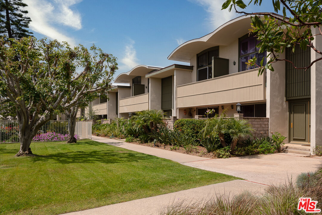 13214 Fiji Way, Unit P Marina del Rey, CA 90292 - Photo 37 of 41 a front view of a house with a yard