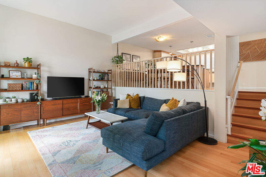 13214 Fiji Way, Unit P Marina del Rey, CA 90292 - Photo 4 of 41 a living room with furniture and a flat screen tv