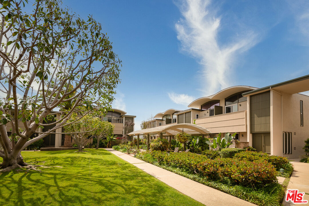 13214 Fiji Way, Unit P Marina del Rey, CA 90292 - Photo 41 of 41 a front view of a house with a yard