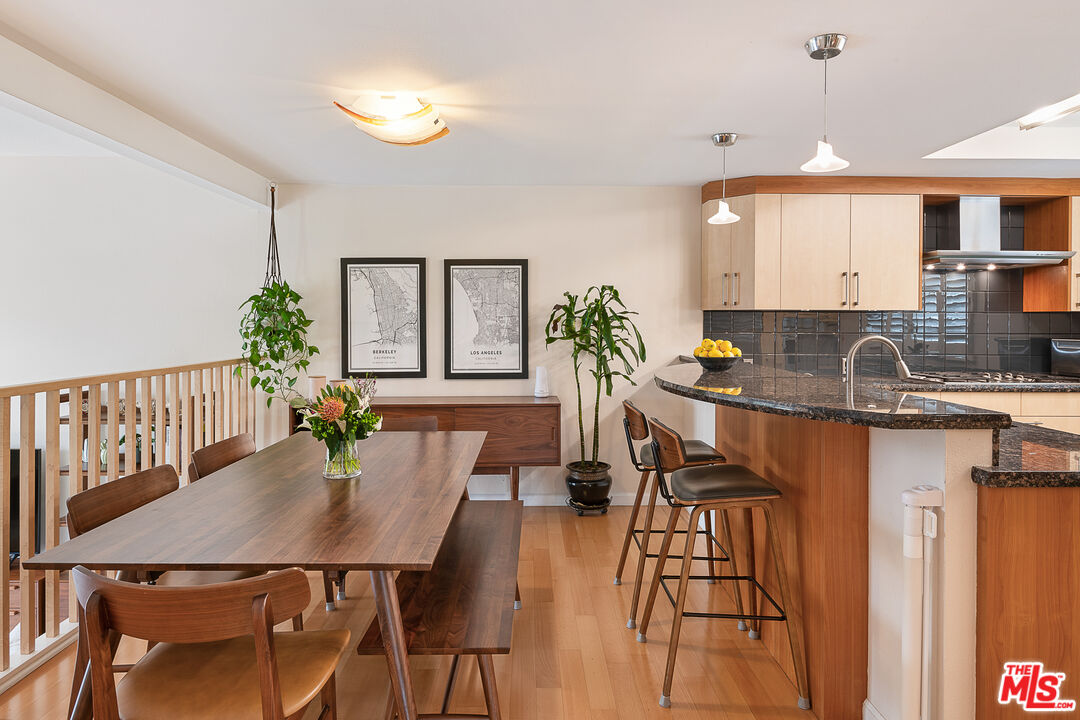 13214 Fiji Way, Unit P Marina del Rey, CA 90292 - Photo 10 of 41 a kitchen with a table chairs and chandelier