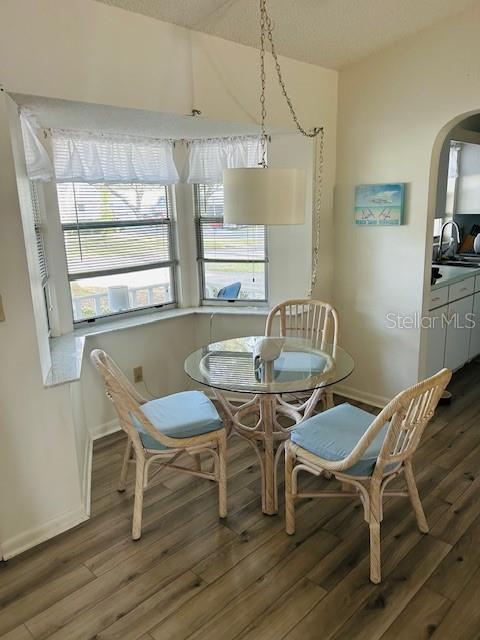 8506 Southwest 93rd Street, Unit B Ocala, FL 34481 - Photo 4 of 8 a view of a dining room with furniture and a window