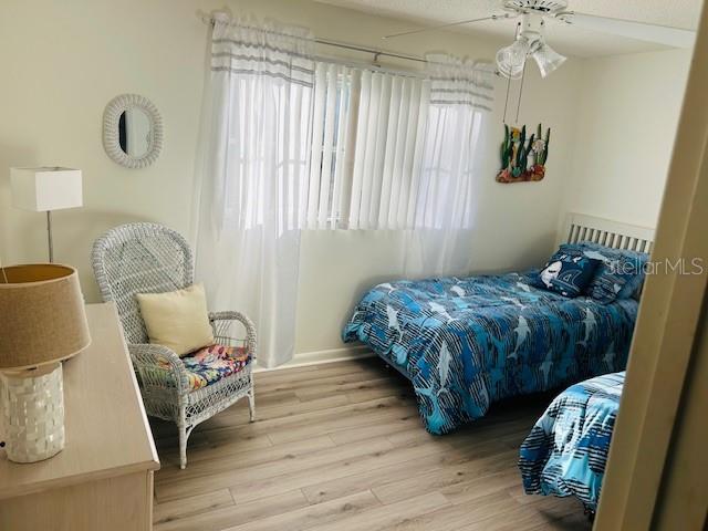 8506 Southwest 93rd Street, Unit B Ocala, FL 34481 - Photo 6 of 8 a bedroom with a bed and window