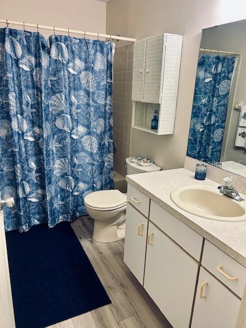 8506 Southwest 93rd Street, Unit B Ocala, FL 34481 - Photo 7 of 8 a bathroom with a sink and a toilet