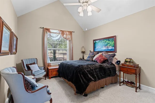 a bathroom with a double vanity sink mirror and shower