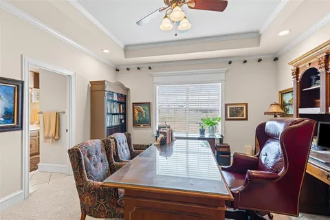 a view of a dining room and hall with furniture