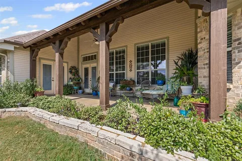a bathroom with a sink a mirror and toilet