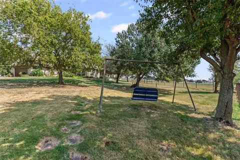 front view of a house with a small yard