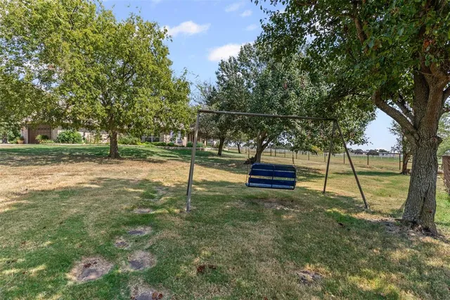 front view of a house with a small yard