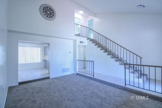 432 Debra Lane Ridgecrest, CA 93555 - Photo 10 of 39 a view of a hallway with staircase