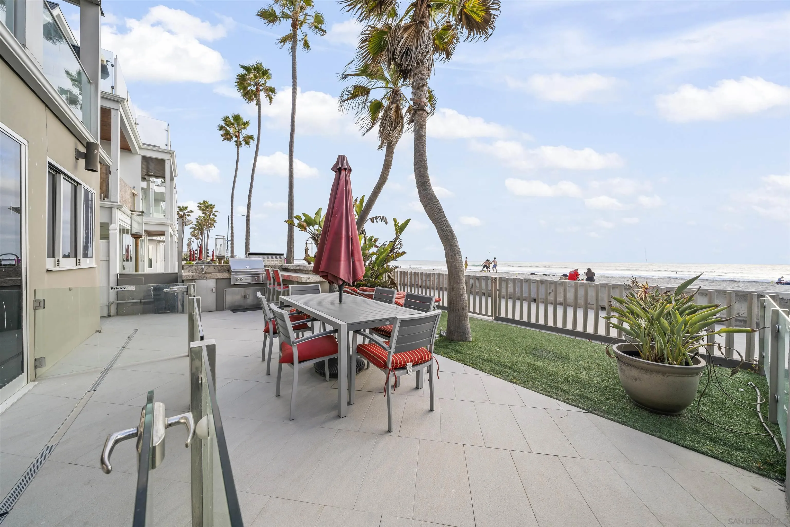 2999 Ocean Front Walk, Unit 2 San Diego, CA 92109 - Photo 25 of 25 a view of a patio with a table and chairs