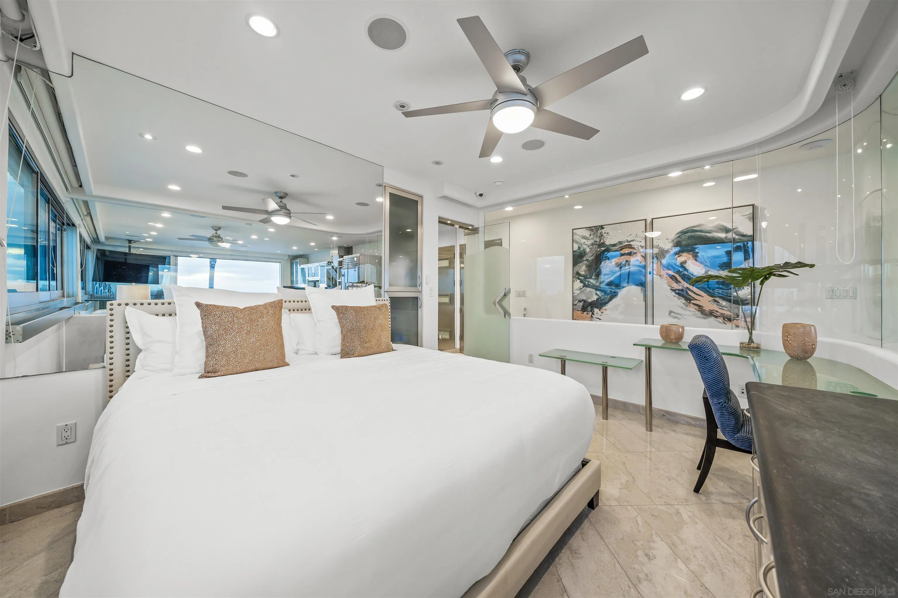 2999 Ocean Front Walk, Unit 2 San Diego, CA 92109 - Photo 10 of 25 a large bedroom with a bed and a table