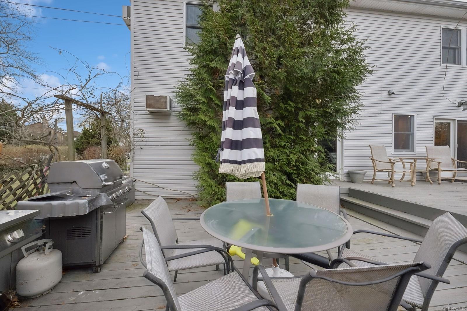 32 Harvard Avenue Hewlett, NY 11557 - Photo 35 of 42 Wooden deck featuring area for grilling