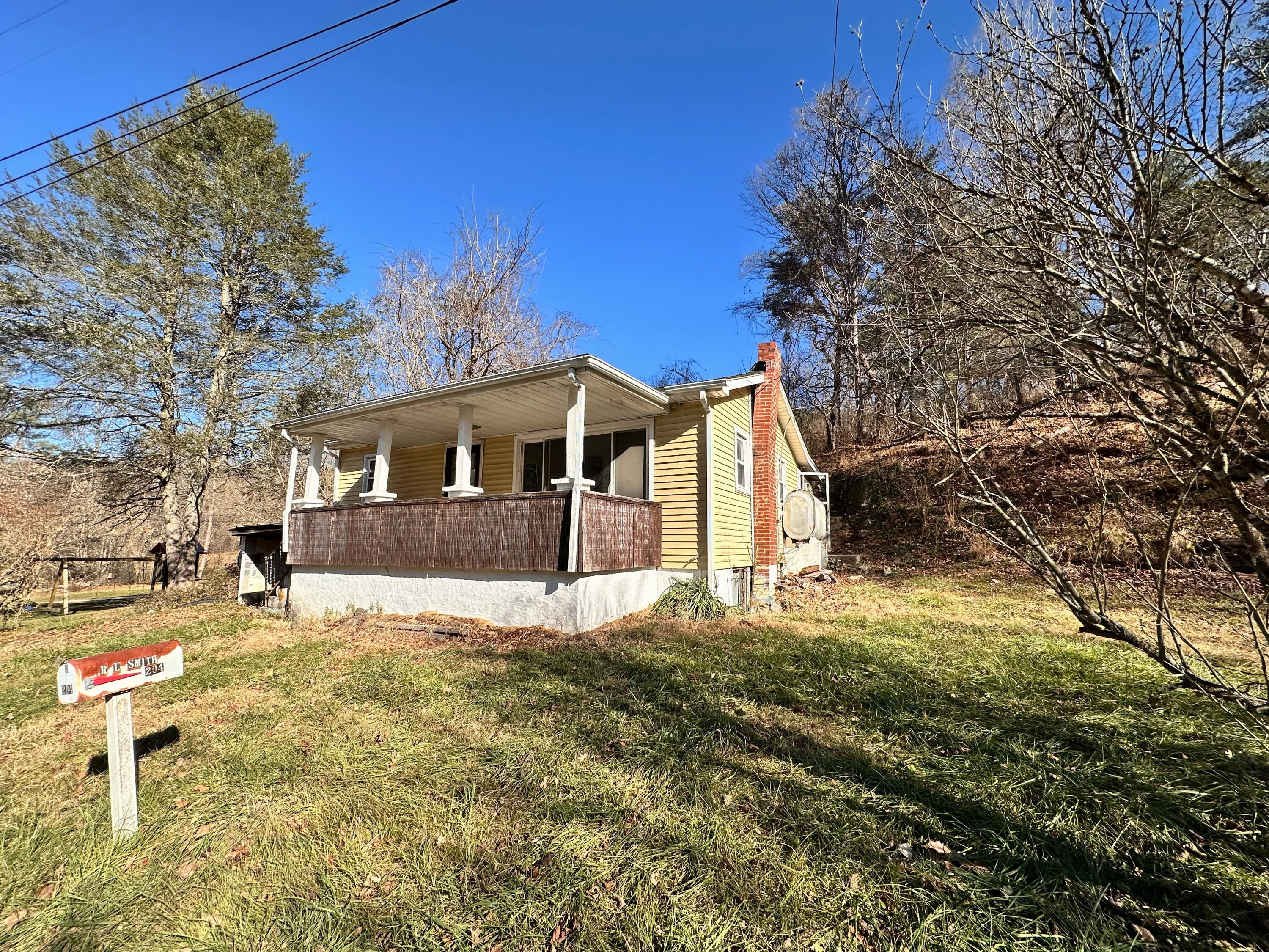 204 Ambrose Road Elliston, VA 24087 - Photo 1 of 19 a view of a yard in front of house