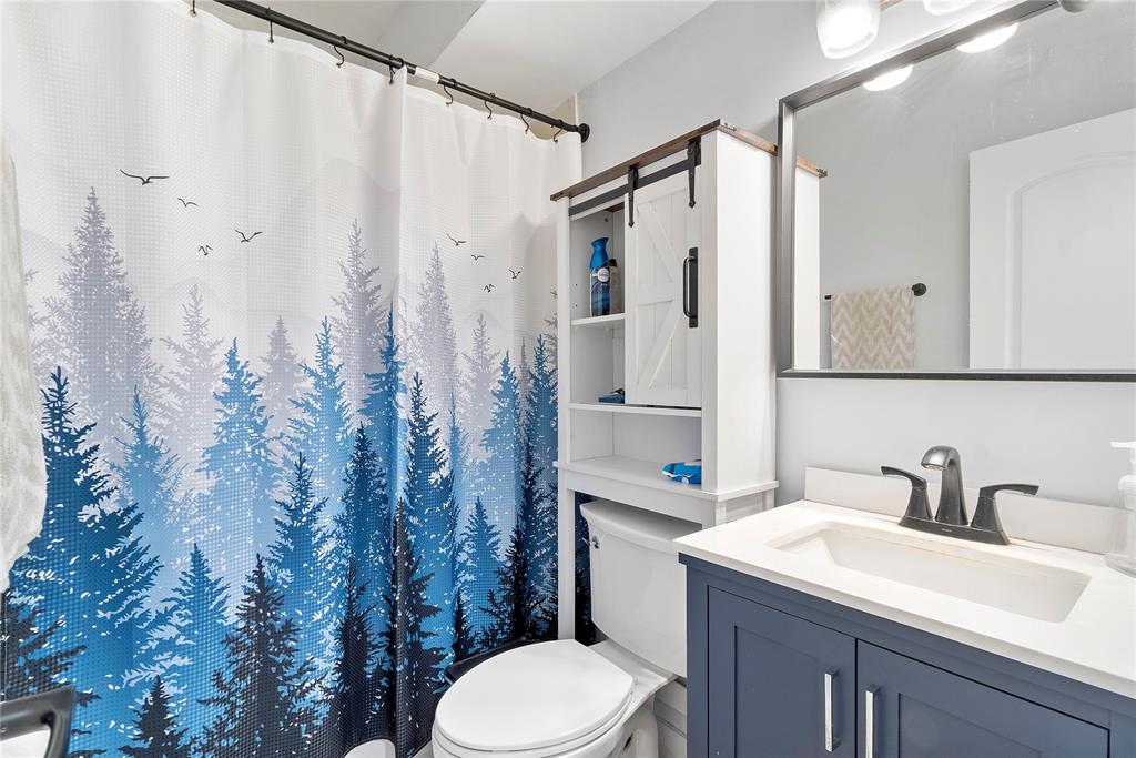 3030 Northeast 5th Terrace, Unit 1 Wilton Manors, FL 33334 - Photo 10 of 22 a bathroom with a sink toilet and shower