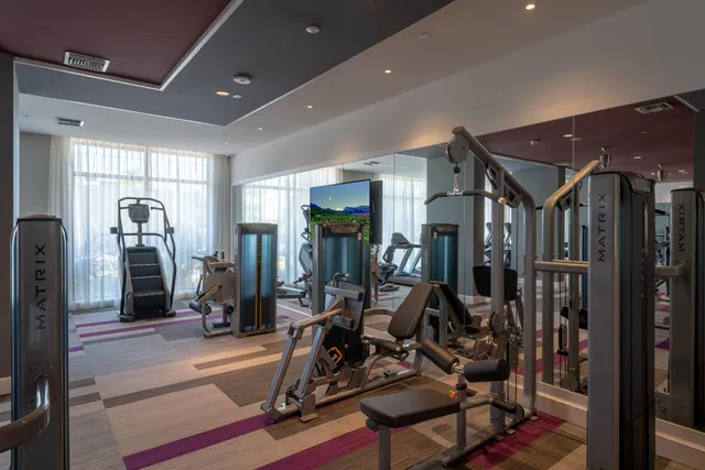 a view of a room with gym equipment