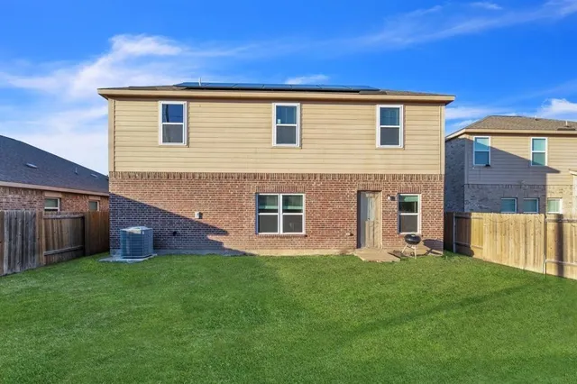 a front view of house with yard