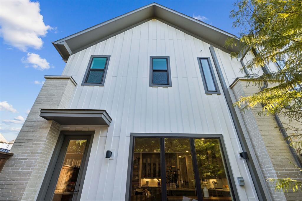 2291 Rook Drive Dallas, TX 75211 - Photo 24 of 26 a front view of a house with glass windows