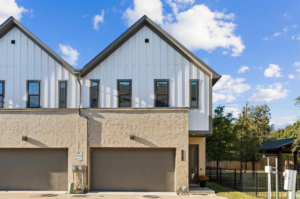 2291 Rook Drive Dallas, TX 75211 - Photo 26 of 26 a front view of a house with a garage