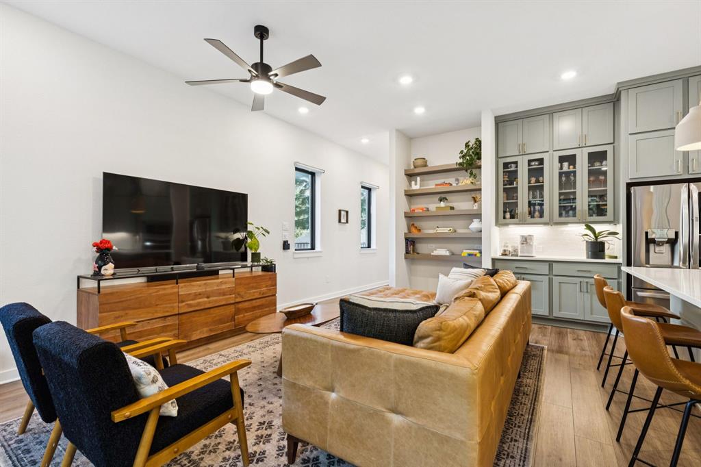 2291 Rook Drive Dallas, TX 75211 - Photo 5 of 26 a living room with furniture and a flat screen tv