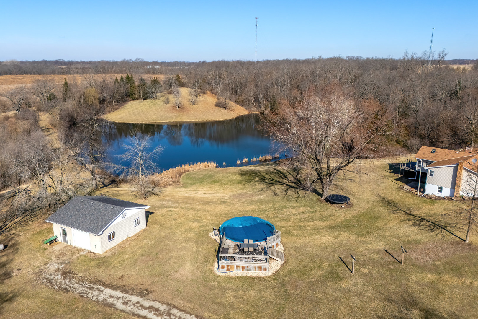14004 252nd Street West Illinois City, IL 61259 - Photo 13 of 49 a view of a swimming pool with a yard