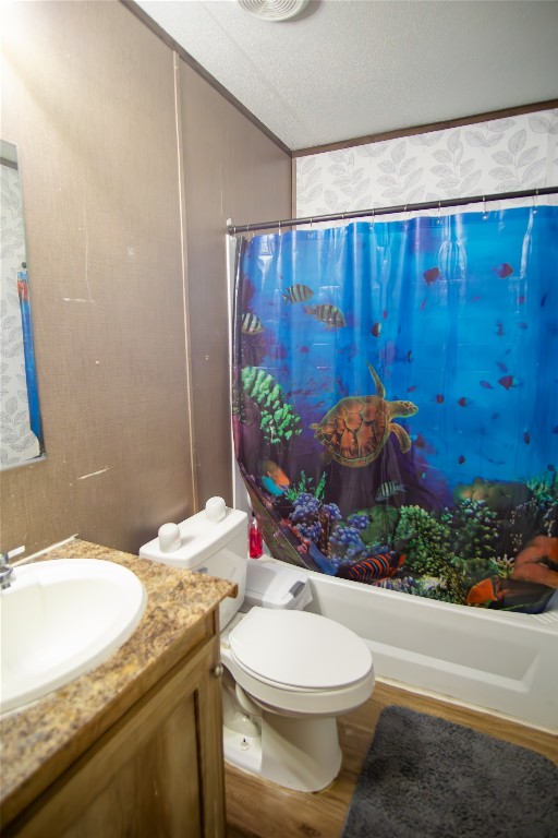 205 Arrowhead Cove Kyle, TX 78640 - Photo 12 of 20 a bathroom with a granite countertop sink and a mirror