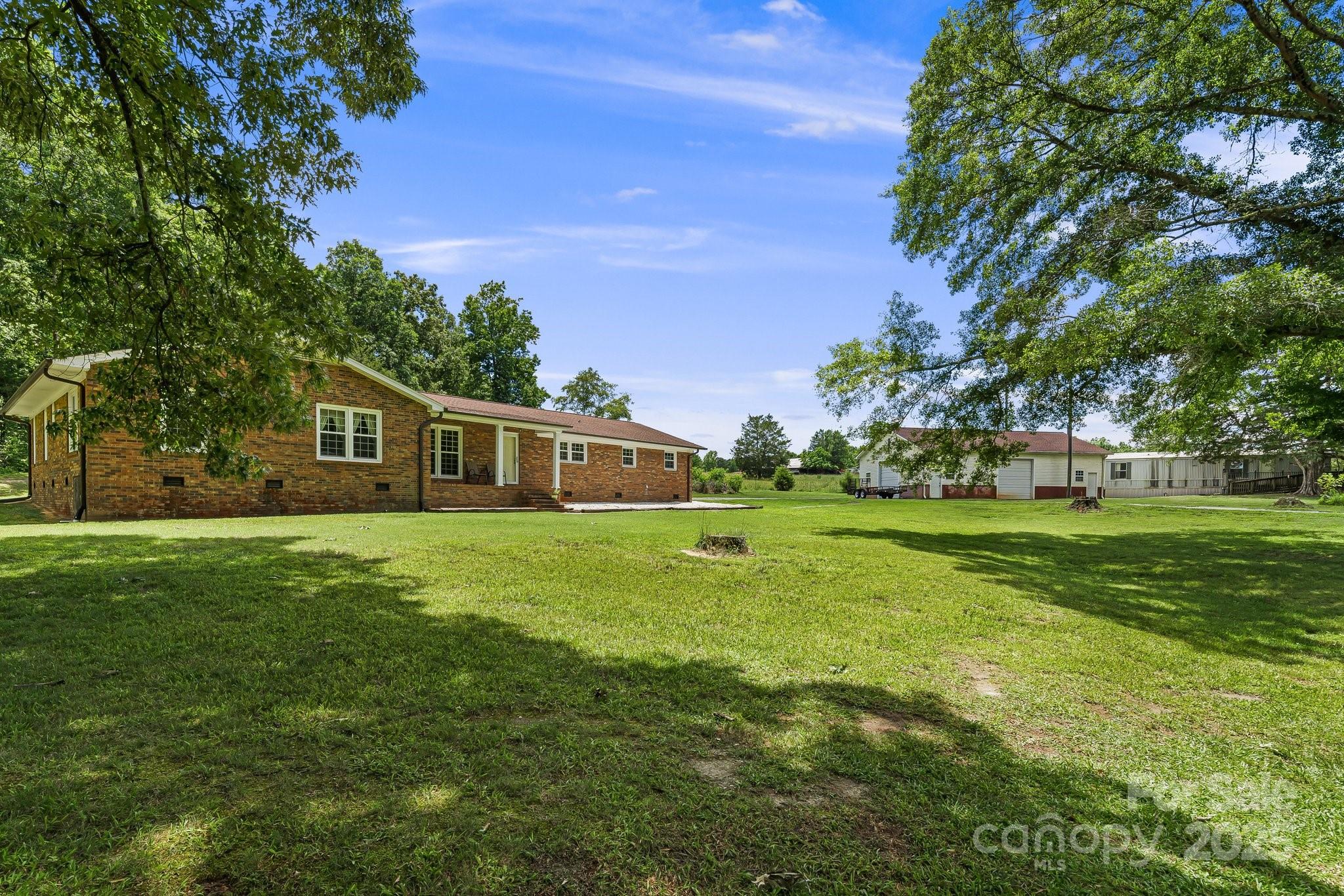 1361 Jack McKinney Road Rutherfordton, NC 28139 - Photo 39 of 46 a front view of a house with garden