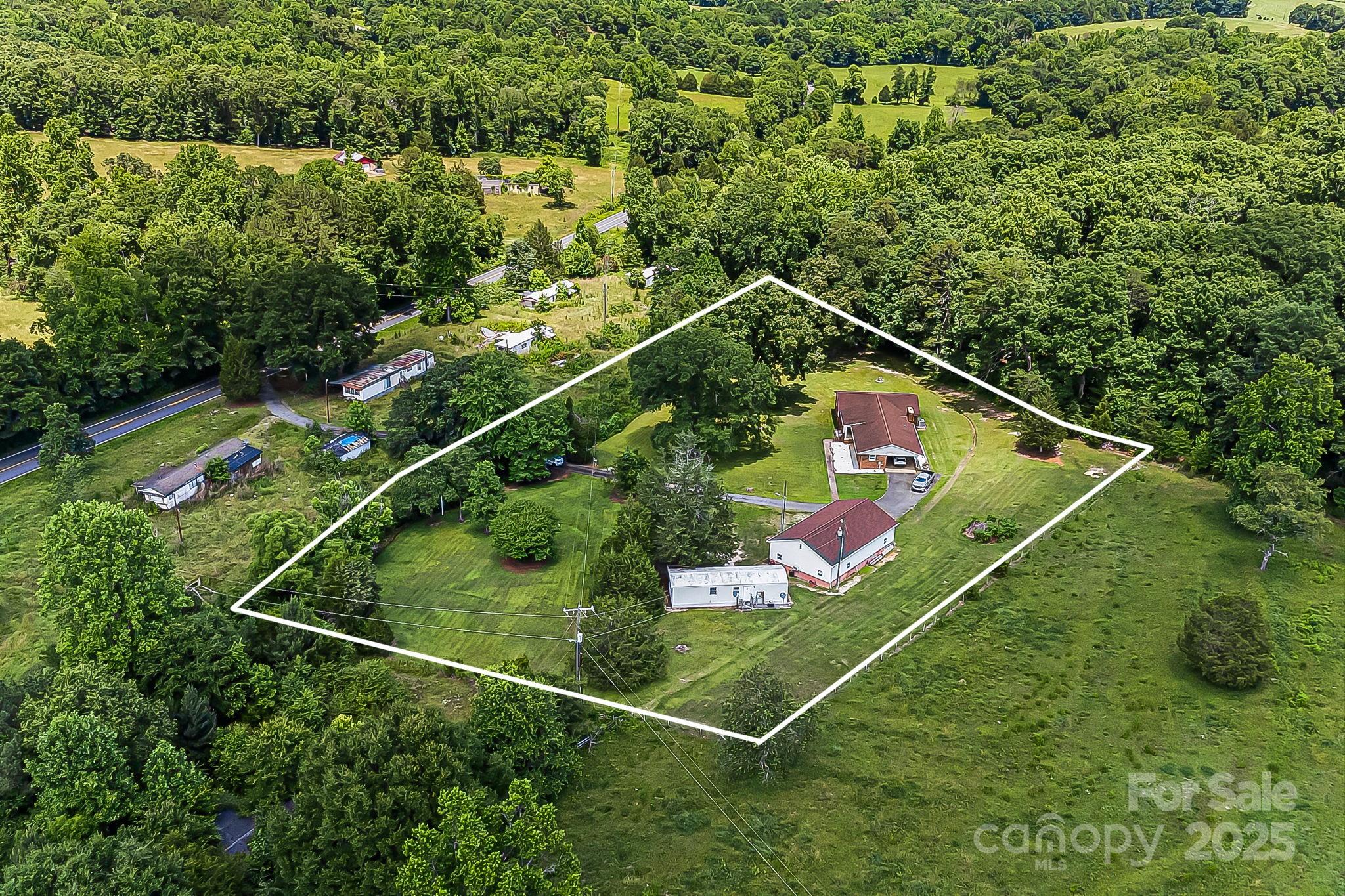 1361 Jack McKinney Road Rutherfordton, NC 28139 - Photo 6 of 46 a view of a tennis court