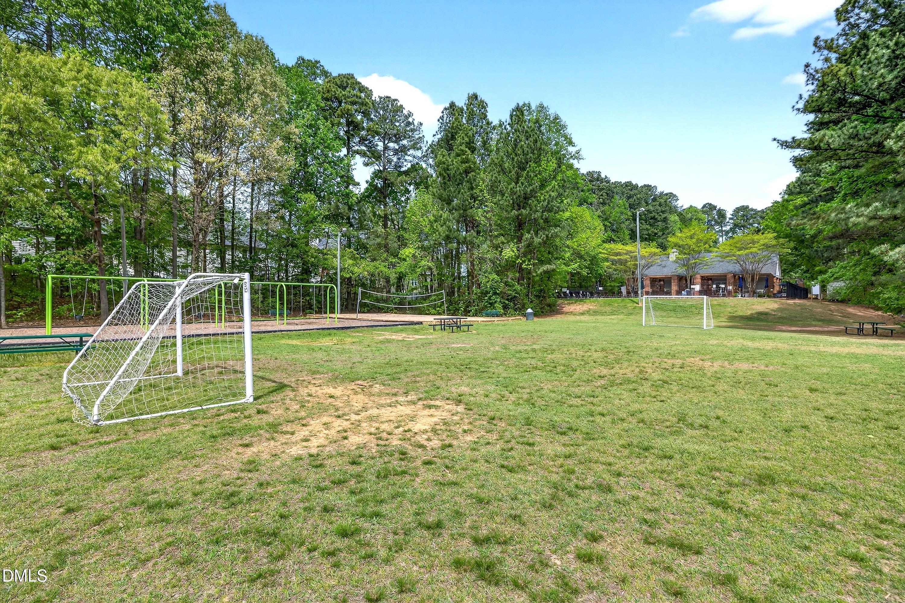 9432 Cartersville Court Raleigh, NC 27617 - Photo 65 of 66 a view of a park with a large tree