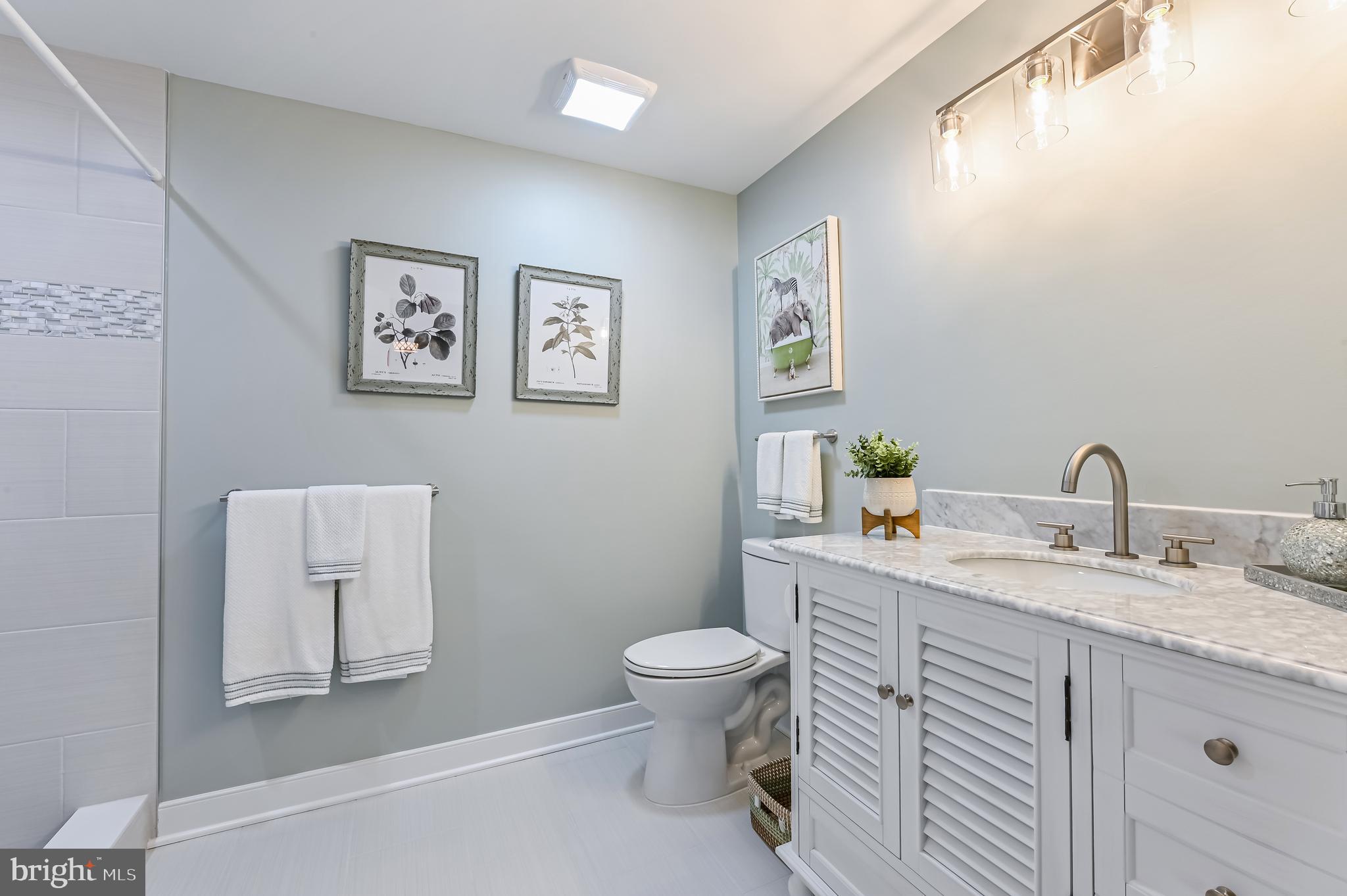 557 Osprey Point Road Crownsville, MD 21032 - Photo 67 of 91 CUSTOM ENSUITE BATH w/ Carrera Marble Top Vanity
